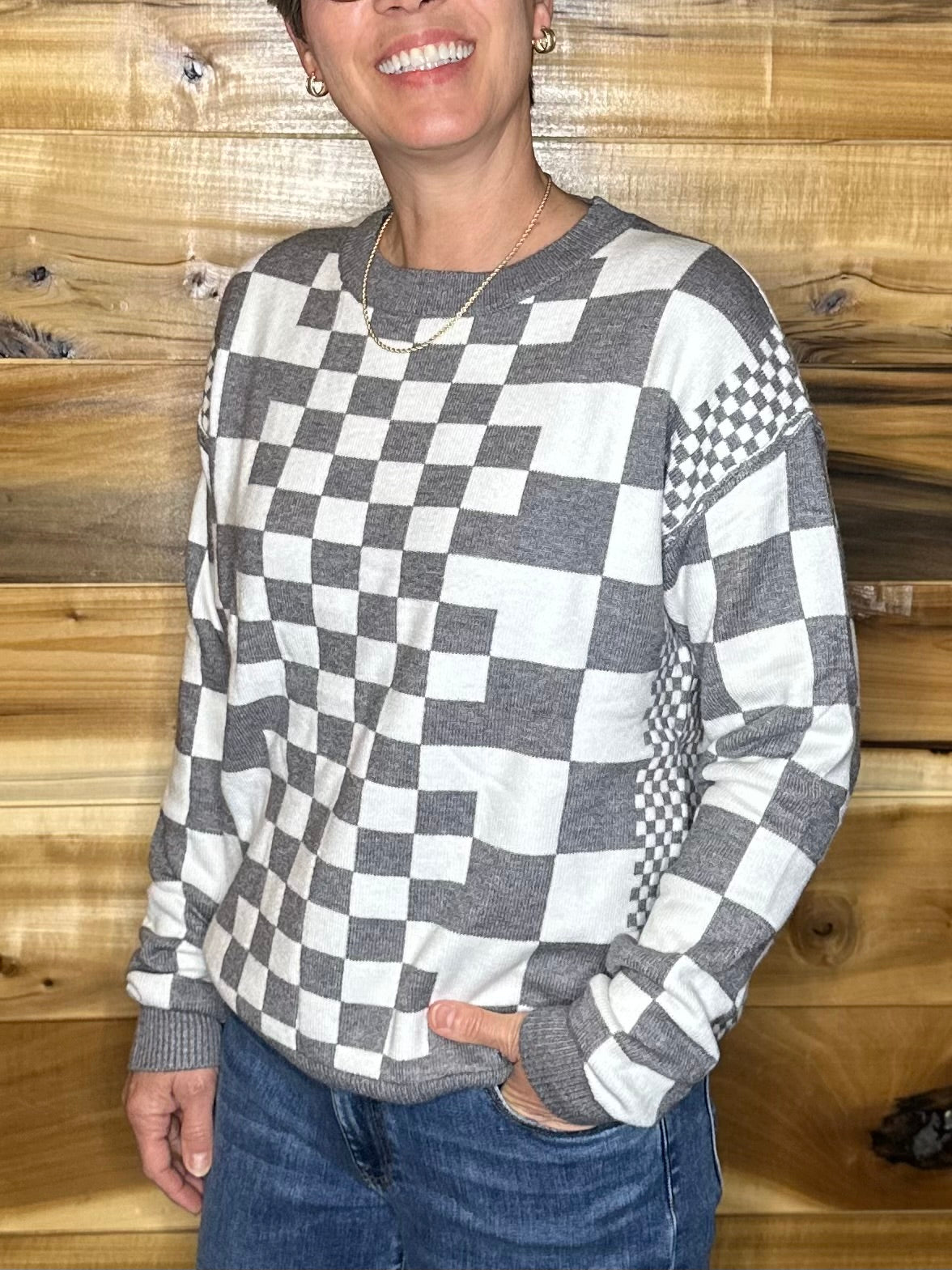 Black and white checkered sweater online